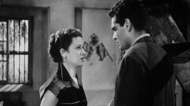 عمر الشريف وفاتن حمامة في مشهد من فيلم 