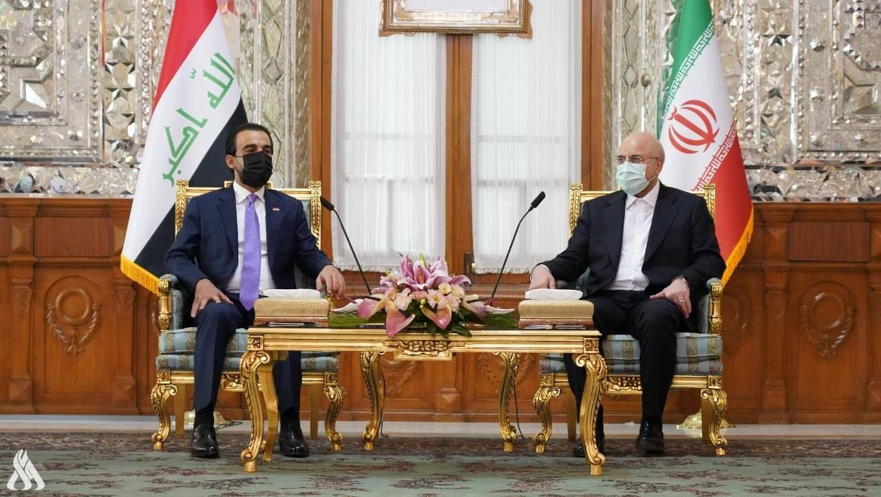  رئيس مجلس الشورى الإيراني محمد باقر قاليباف مستقبلاً رئيس البرلمان العراقي محمد الحلبوسي 