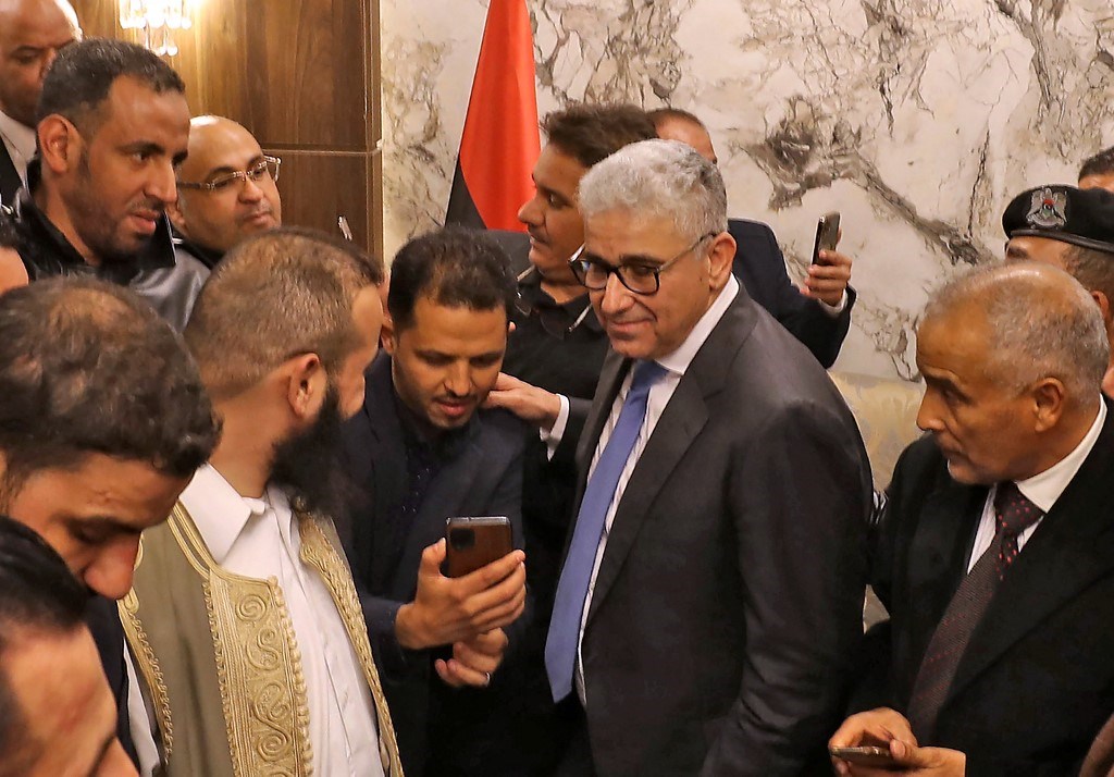 رئيس الحكومة الليبي فتحي باشاغا في مطار معيتيقة الدولي في طرابلس 10 شباط/ فبراير 2022 (أ ف ب).