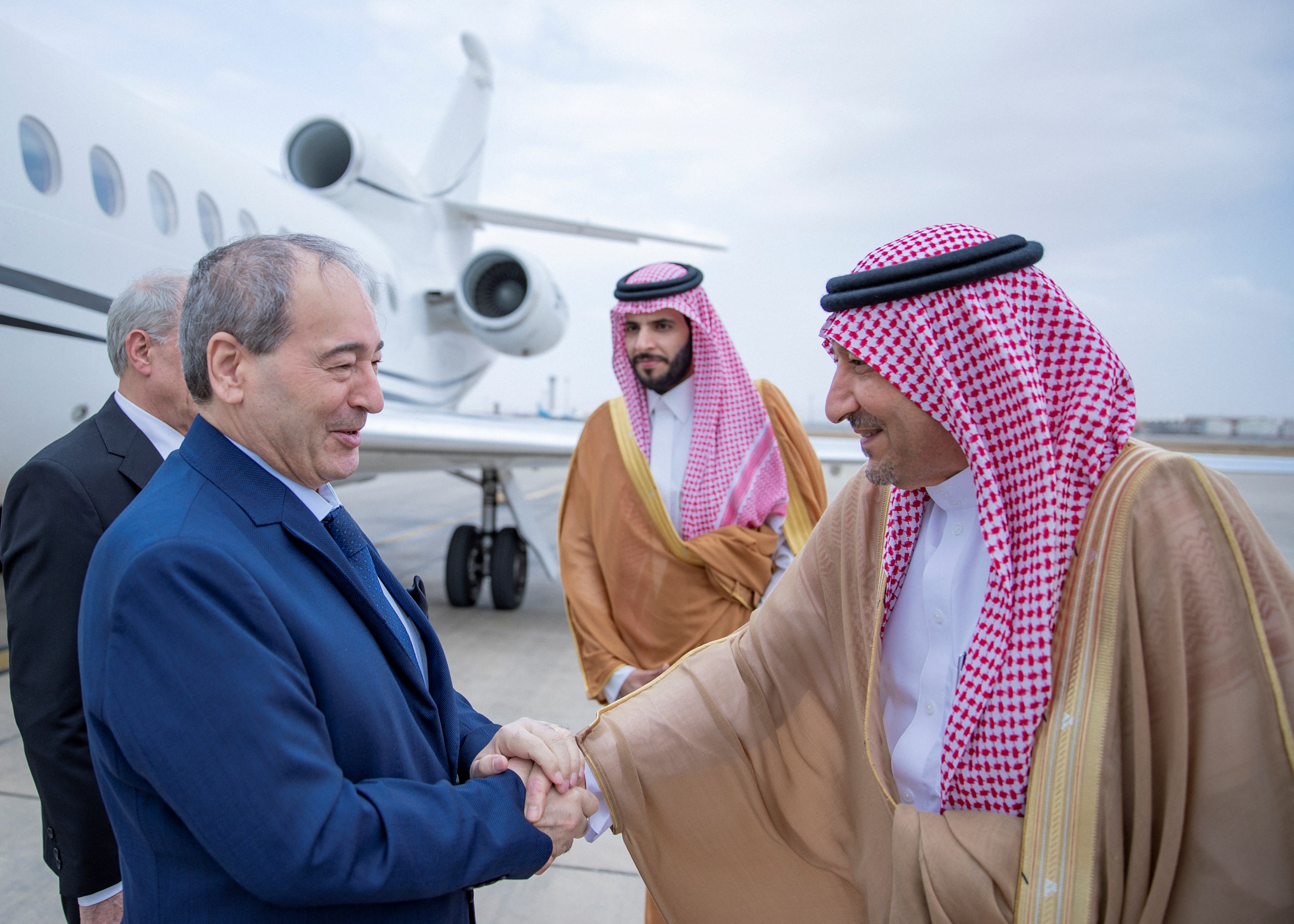 وزير الخارجية السعودي وليد بن عبدالكريم الخريجي ونظيره السوري فيصل المقداد
