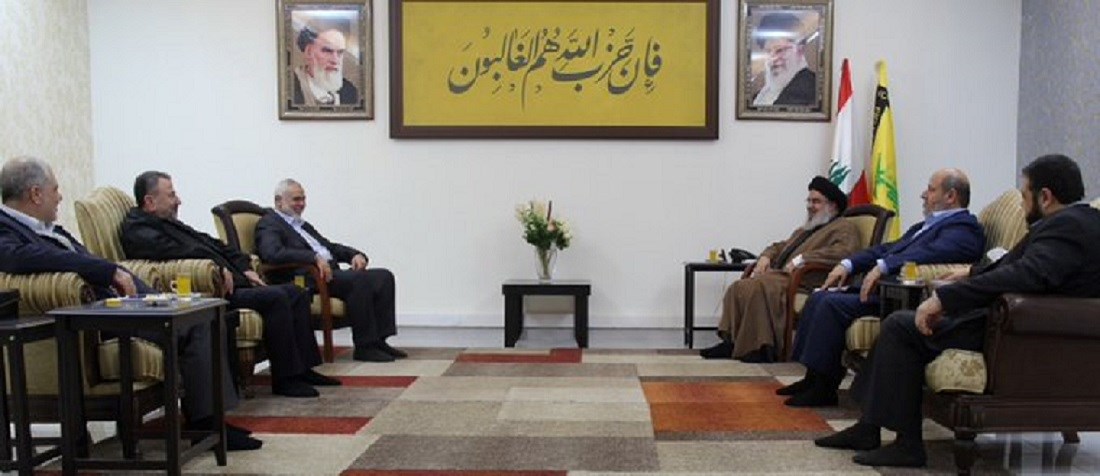 السيد حسن نصر الله مستقبلاً وفد حركة 