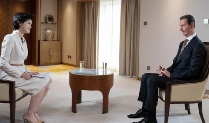 الرئيس السوري بشار الأسد خلال مقابلته على تلفزيون الصين المركزي