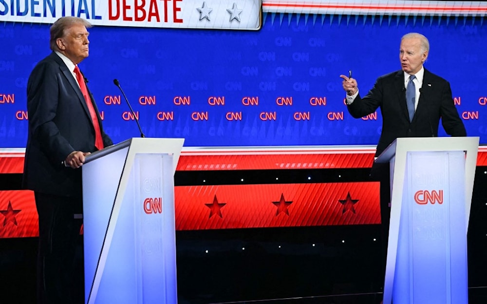 الرئيس الأميركي الحالي جو بايدن والرئيس الأميركي السابق دونالد ترامب خلال المناظرة الأولى بينهما قبل الانتخابات (أ ف ب)