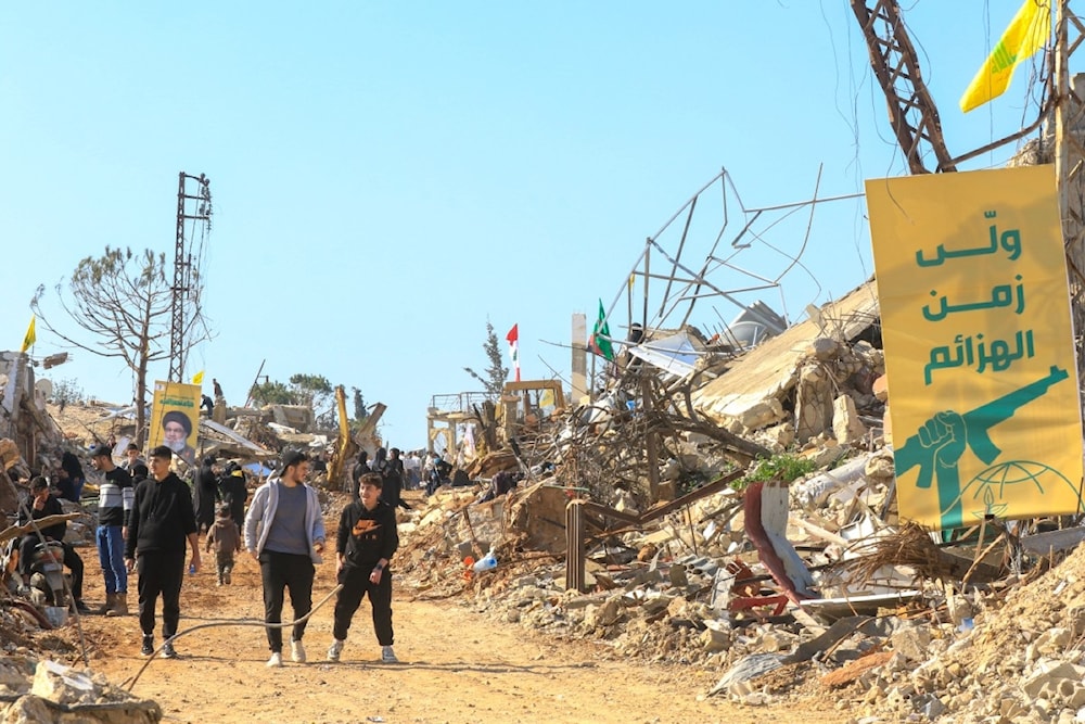 من عودة الأهالي إلى عيتا الشعب اللبنانية، عند الحدود مع فلسطين المحتلة (أ ف ب)