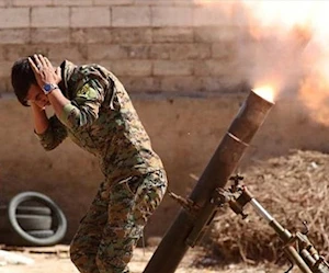 أحد مقاتلي قوات سوريا الديمقراطية "قسد" - أرشيف (رويترز) أحد مقاتلي قوات سوريا الديمقراطية "قسد" - أرشيف (رويترز)