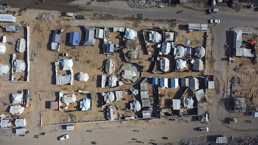 صورة جوية لساحة الجندي المجهول، التي تحولت إلى أنقاض، في حي الرمال شمال مدينة غزة (أ ف ب)