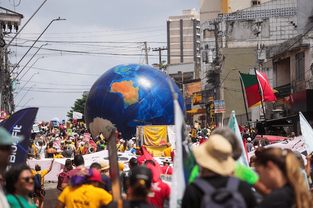 مصدر الصورة: غرينبيس - خلال فعاليات كوب30 في بيليم بالبرازيل
