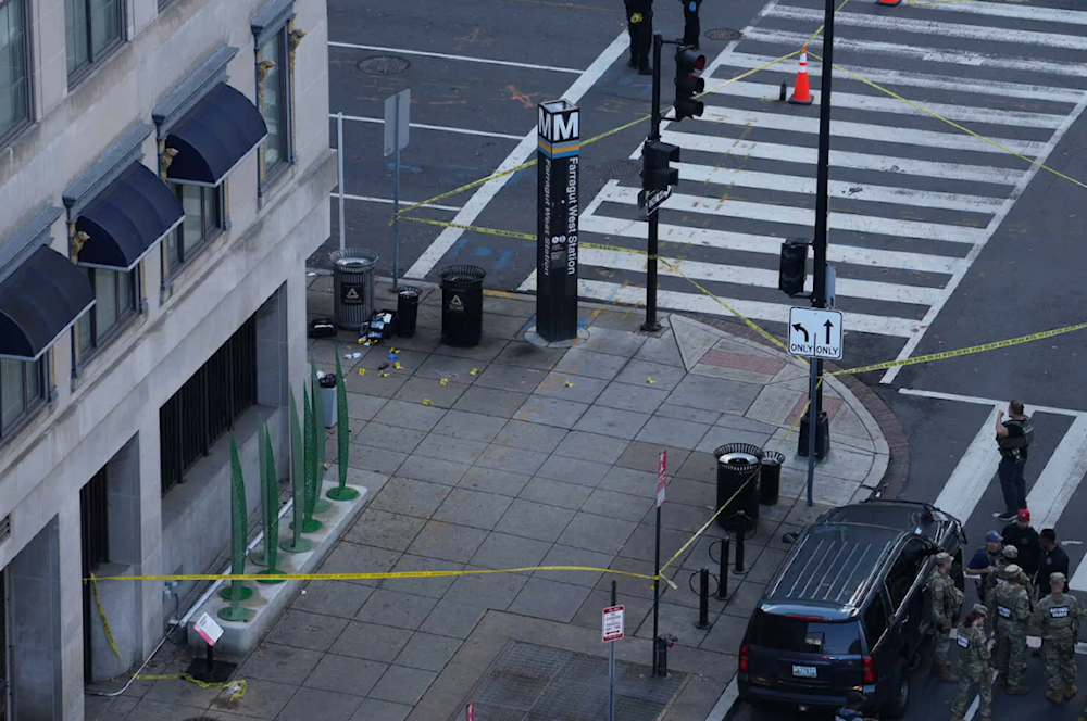 من مكان إطلاق النار قرب البيت الأبيض، حيث أُصيب عنصران من الحرس الوطني (