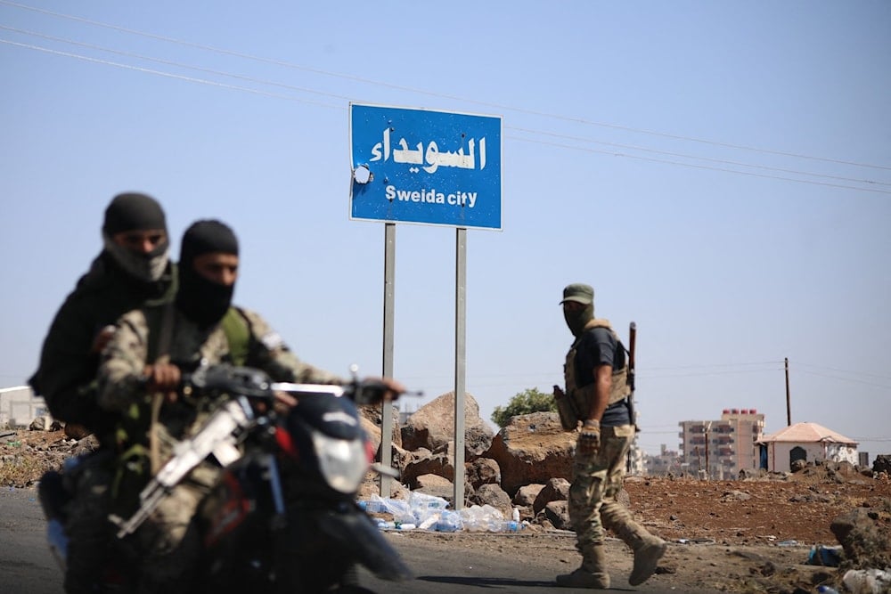 عناصر من الأمن العام السوري على أطراف مدينة السويداء -أرشيف (أ ف ب)