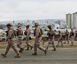 قوات مشاة في البحرية الأميركية تقوم بدوريات في منطقة الحدود بين الولايات المتحدة والمكسيك (أ ف ب) قوات مشاة في البحرية الأميركية تقوم بدوريات في منطقة الحدود بين الولايات المتحدة والمكسيك (أ ف ب)