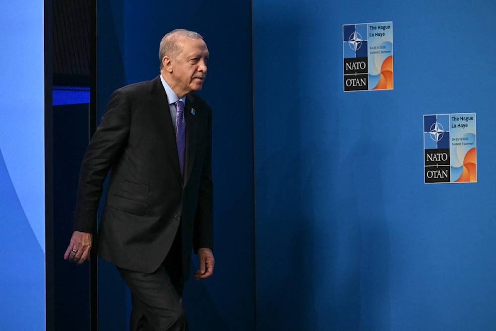 الرئيس التركي رجب طيب إردوغان مشاركاً في قمة حلف الناتو (أ ف ب)