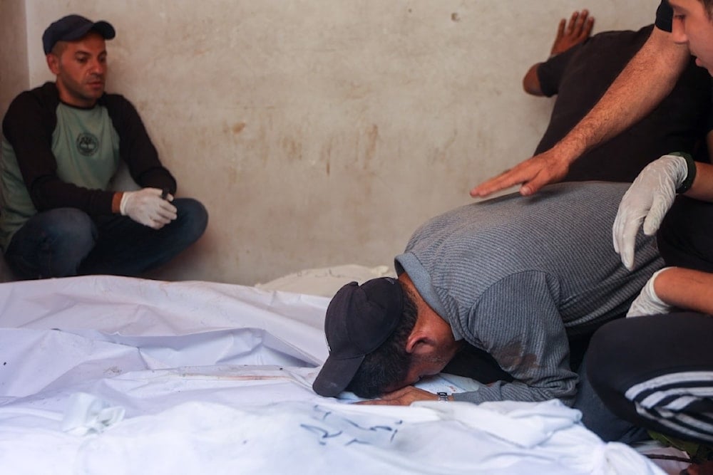 جثامين شهداء ارتقوا في القصف الإسرائيلي على جباليا شمالي قطاع غزة (أ ف ب)