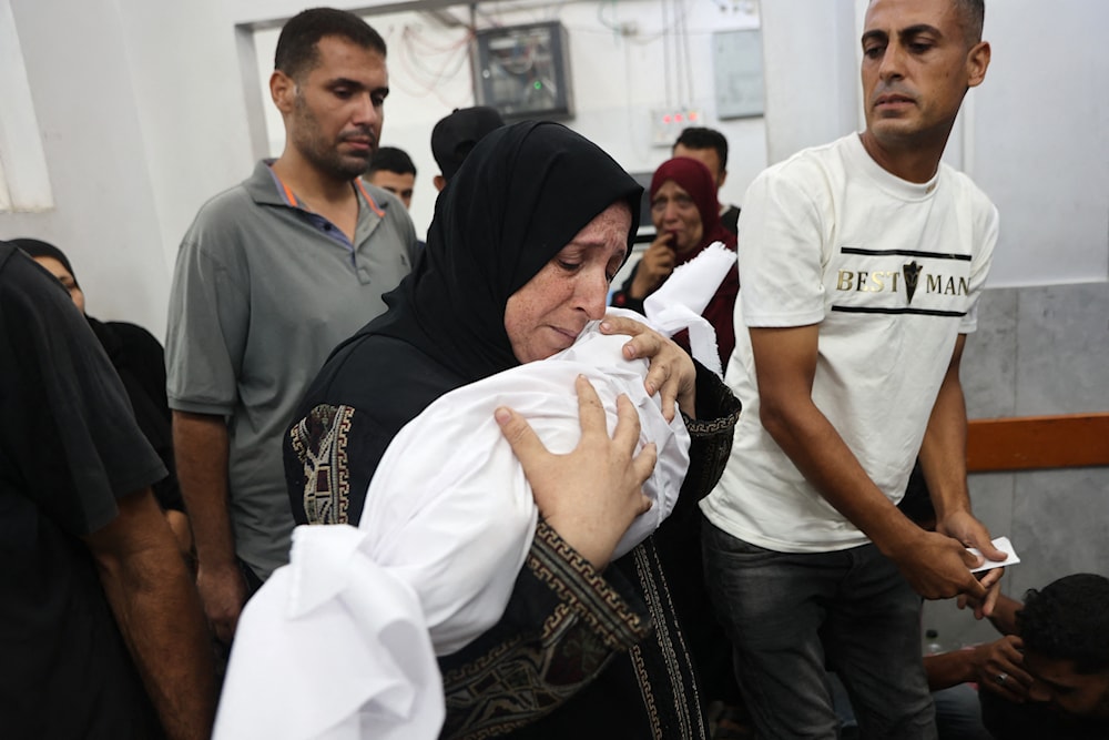 طفل شهيد في القصف الإسرائيلي على قطاع غزة (AFP)