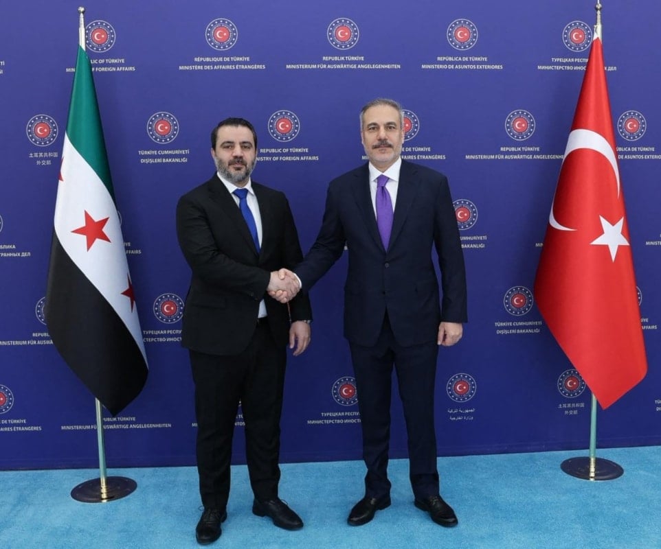 فيدان والشيباني خلال لقائهما اليوم 13 آب/أغسطس 2025 (أ ف ب)