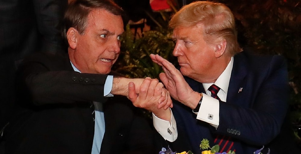الرئيس الأميركي دونالد ترامب ورئيس البرازيل السابق جايير بولسونارو في 2020 (رويترز)